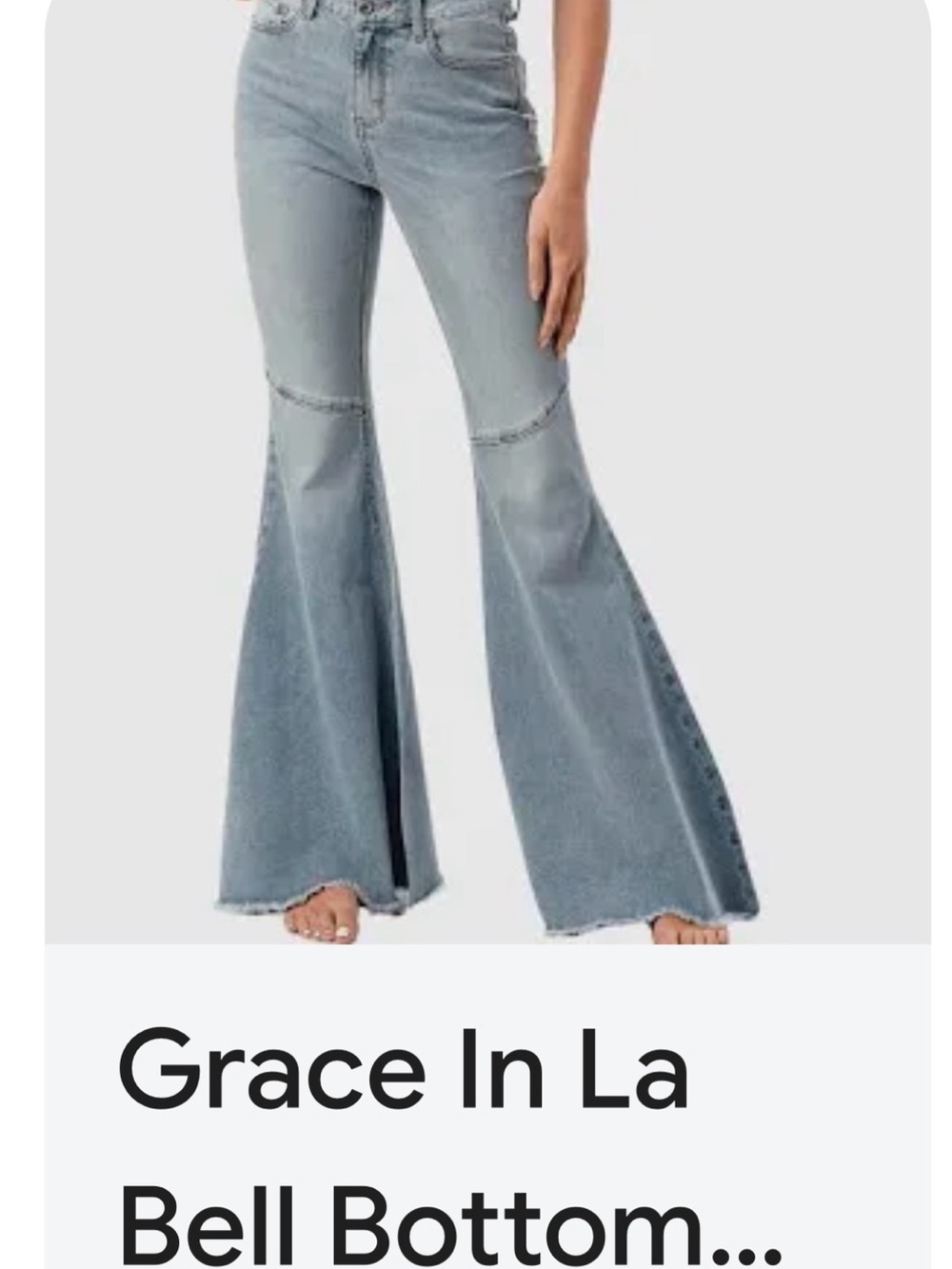 Grace in LA
Size 27. Light Blue Flared Bell Bottom Jeans
